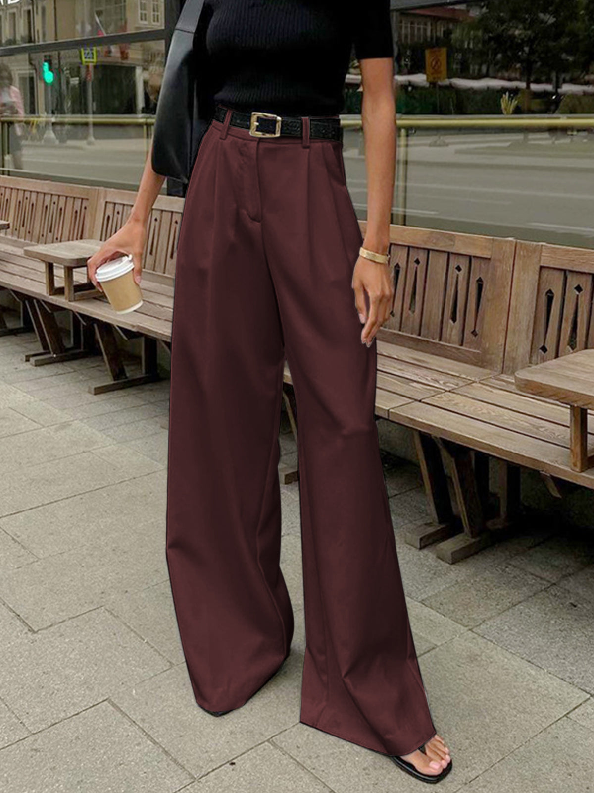Julia women's relaxed-fit wide-leg office trousers by Jesie-London, shown in a stylish relaxed-fit silhouette and tailored fabric.