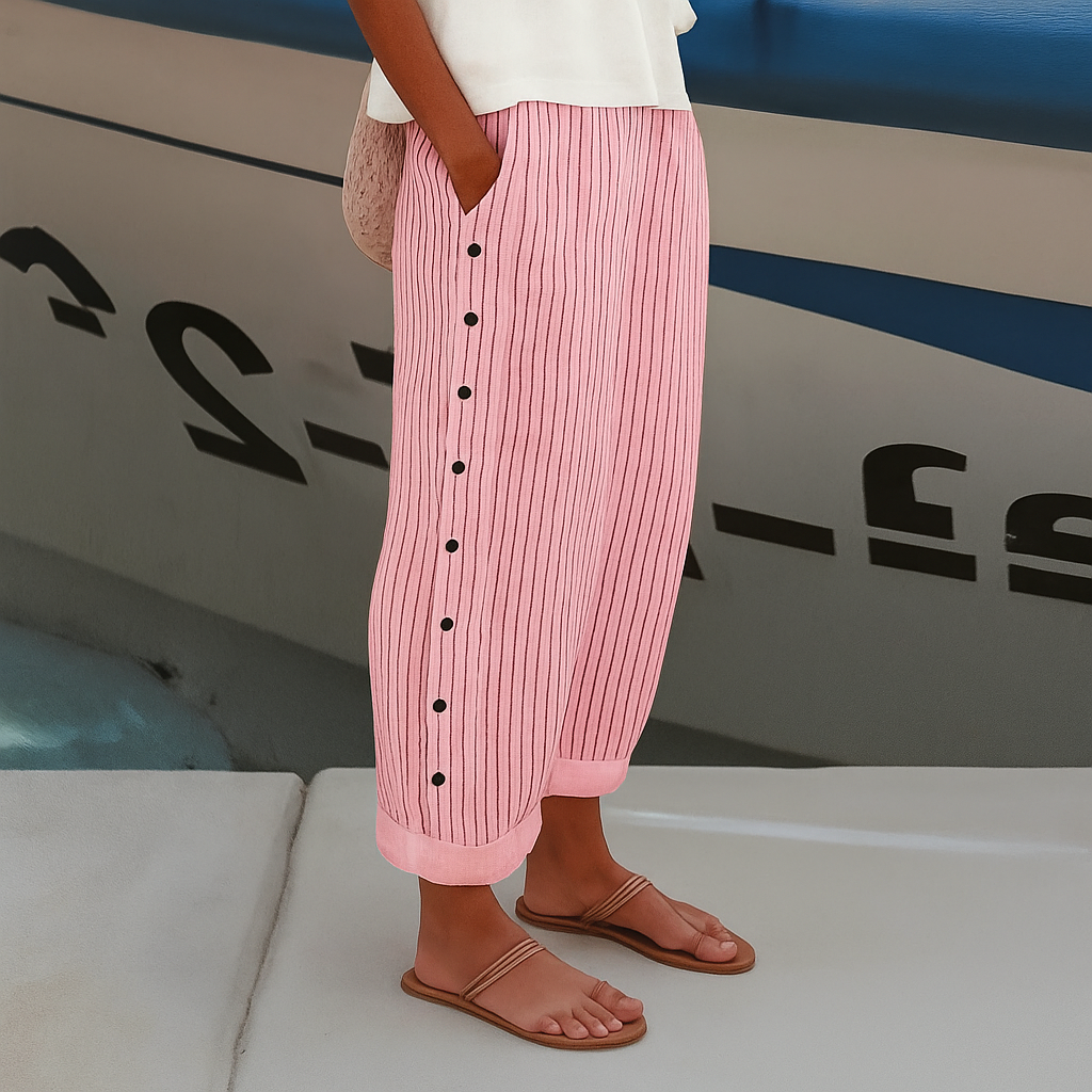 Women’s striped casual pants with button details from Jesie-London, featuring a relaxed fit and stylish design.