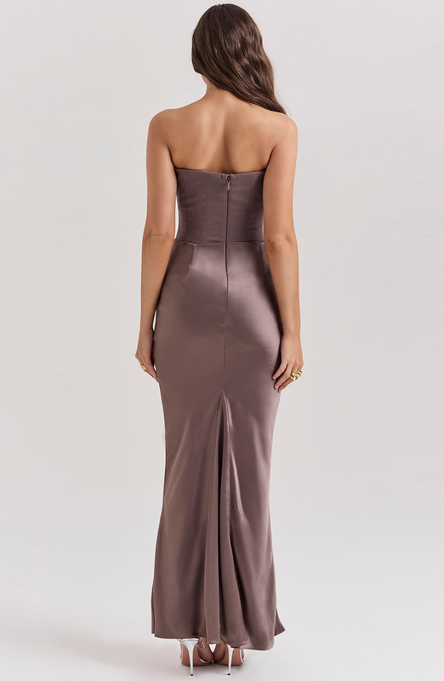 Jesie-London Camille strapless corset bodycon maxi dress on a woman, featuring a sleek, fitted design perfect for elegant occasions.