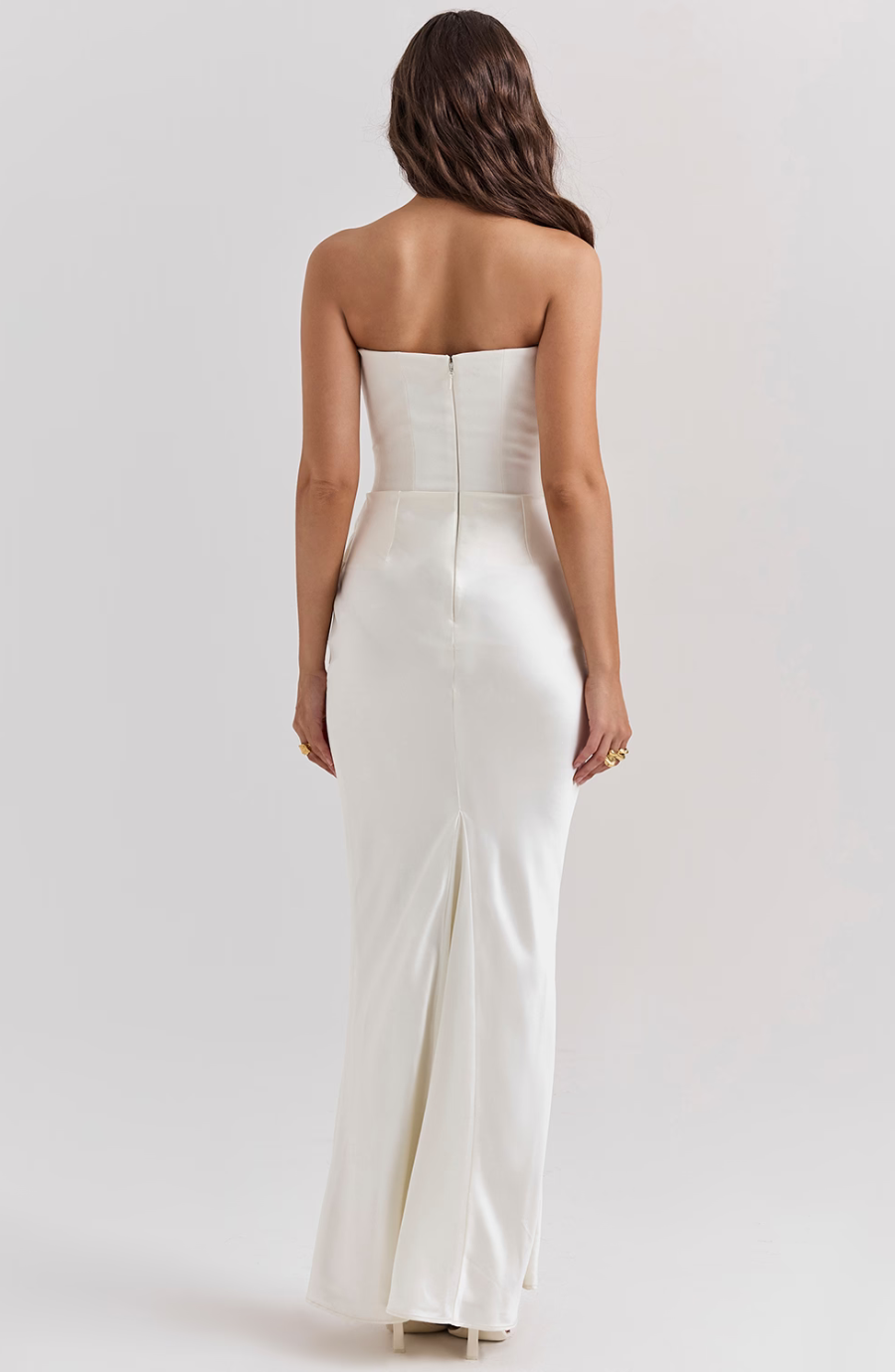 Jesie-London Camille strapless corset bodycon maxi dress on a woman, featuring a fitted silhouette and elegant design.