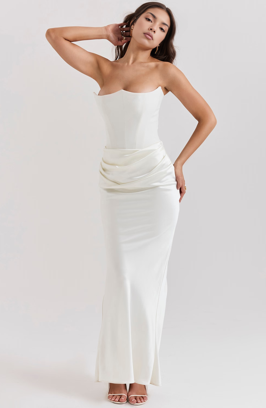 Jesie-London Camille women's strapless corset bodycon maxi dress, form-fitting black gown with elegant design and smooth fabric.