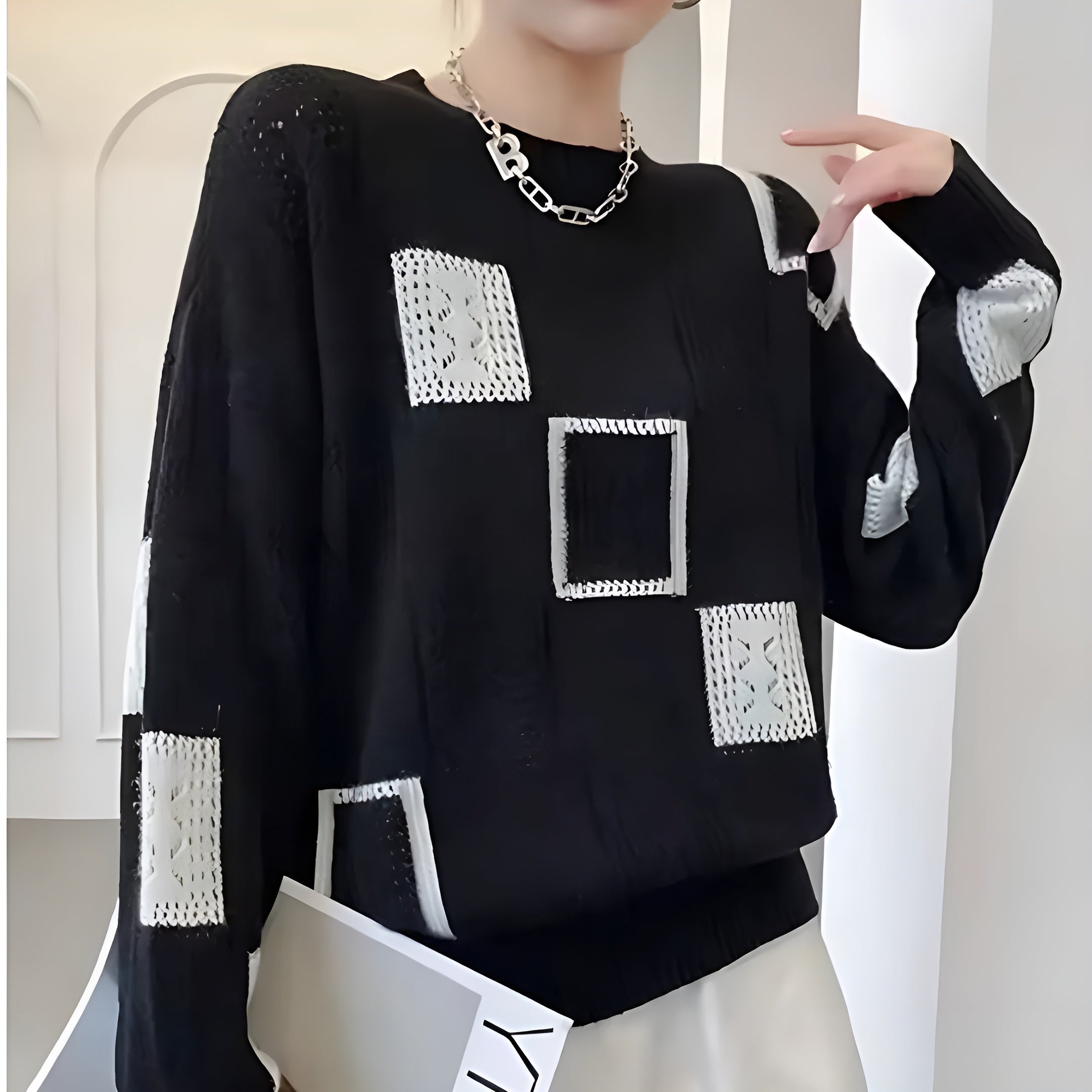 Women’s spring casual top by Jesie-London featuring a geometric pattern and relaxed fit, perfect for a stylish, comfortable look.