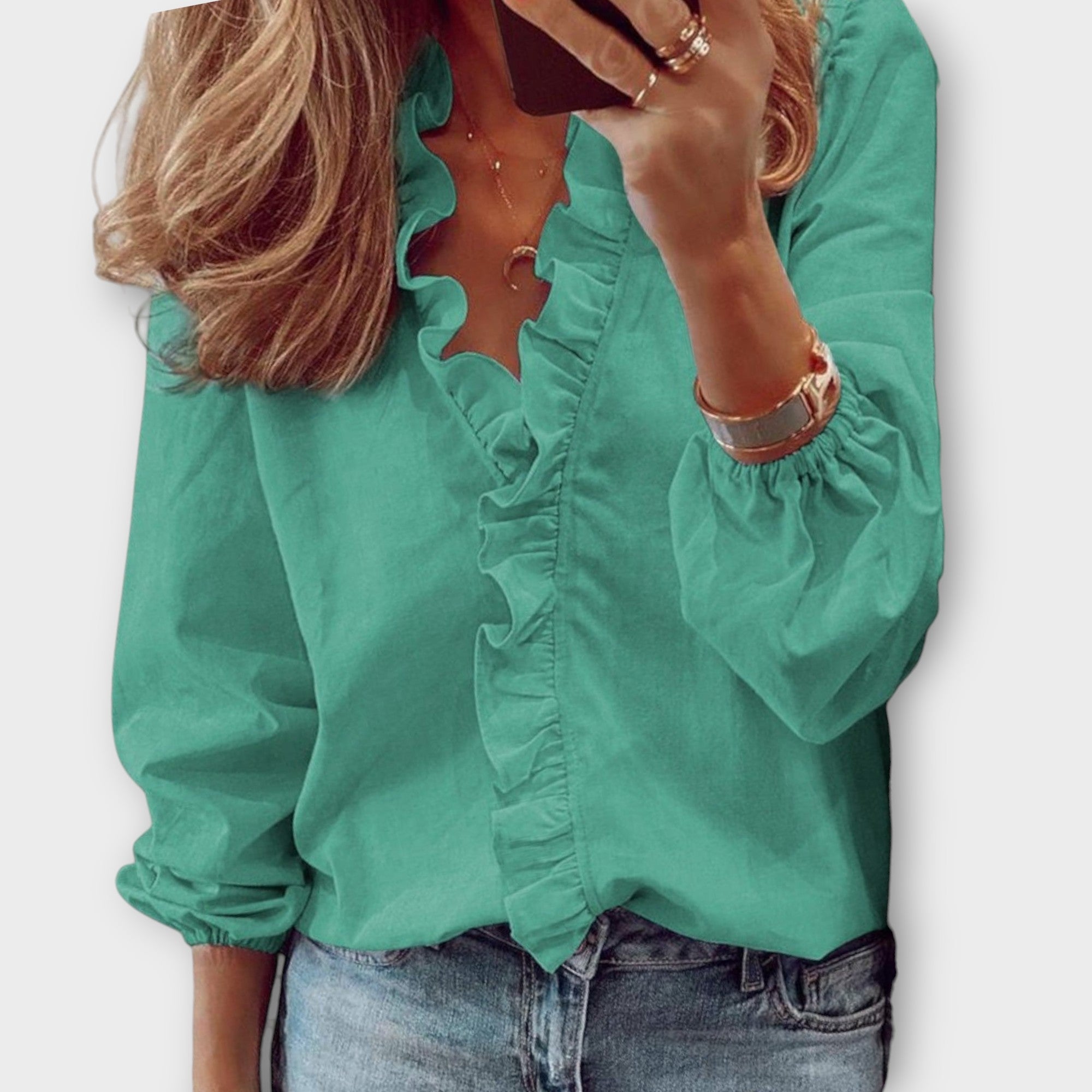 Jesie-London Georgia women's ruffle V-neck long sleeve blouse, shown in a stylish design with ruffled details and a V-neck cut.