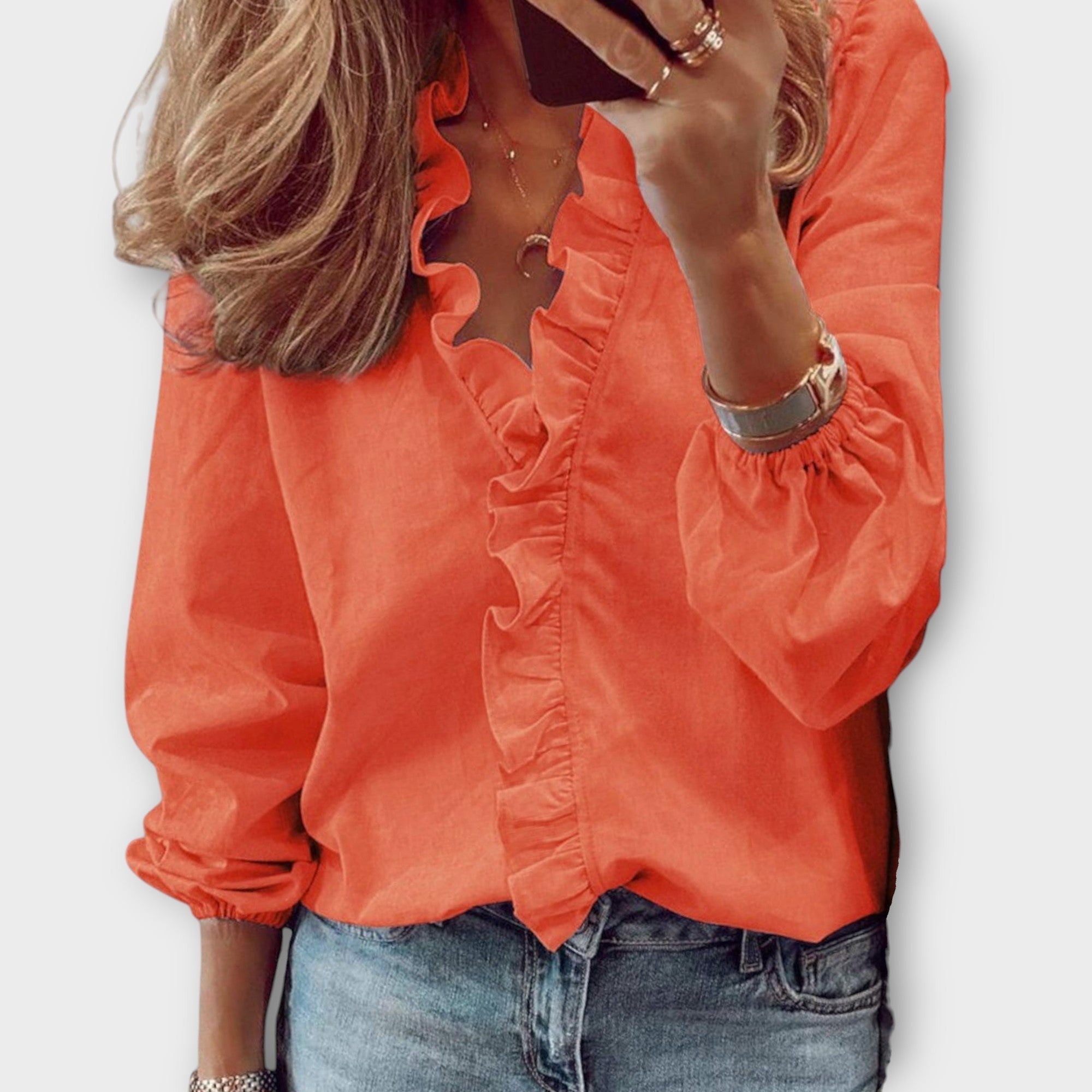 Women’s ruffle V-neck long sleeve blouse by Jesie-London in Georgia, featuring a stylish ruffle detail and elegant design.