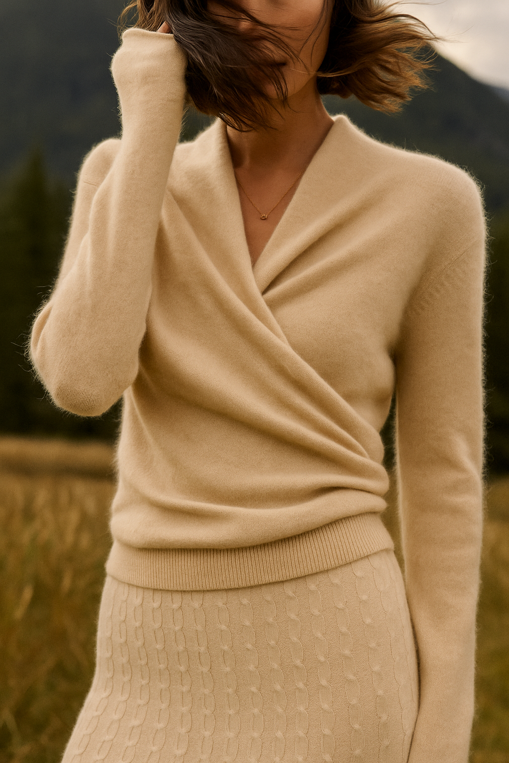 Ivory Jesie-London Kate women's elegant wrap crossover chic cashmere sweater, showcasing a sophisticated, stylish design.