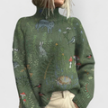 Jesie-London Margaret women's cozy knit sweater with nature print, paired with a short-sleeve shirt and shorts ensemble.