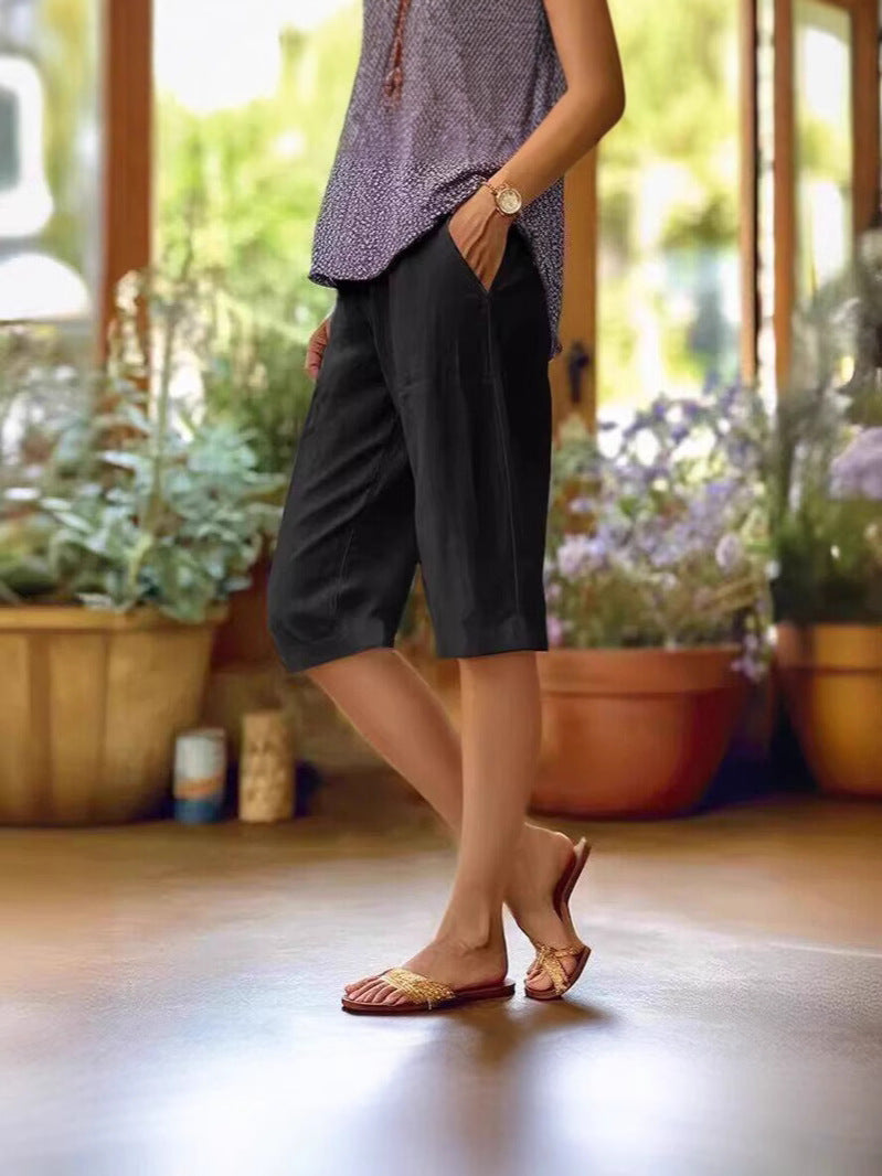 Women’s relaxed pocket knee-length pants by Jesie-London, featuring a comfortable fit and casual style, shown in a neutral color.