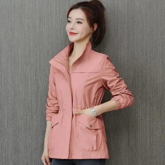 Women’s lightweight waterproof trench coat by Jesie-London, khaki casual, mid-length with adjustable waist, suitable for spring.