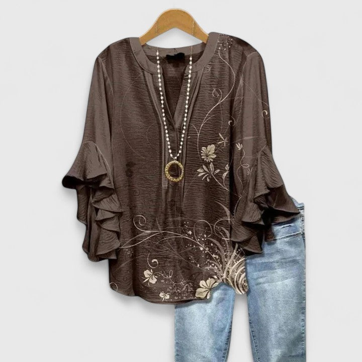 Jesie-London Katie women's floral ruffle sleeve casual top with lightweight fabric and feminine design.