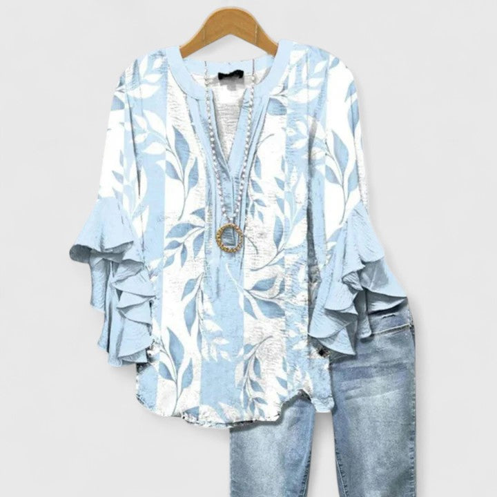 Jesie-London Katie women's floral ruffle sleeve casual top with a relaxed fit and vibrant floral pattern on lightweight fabric.