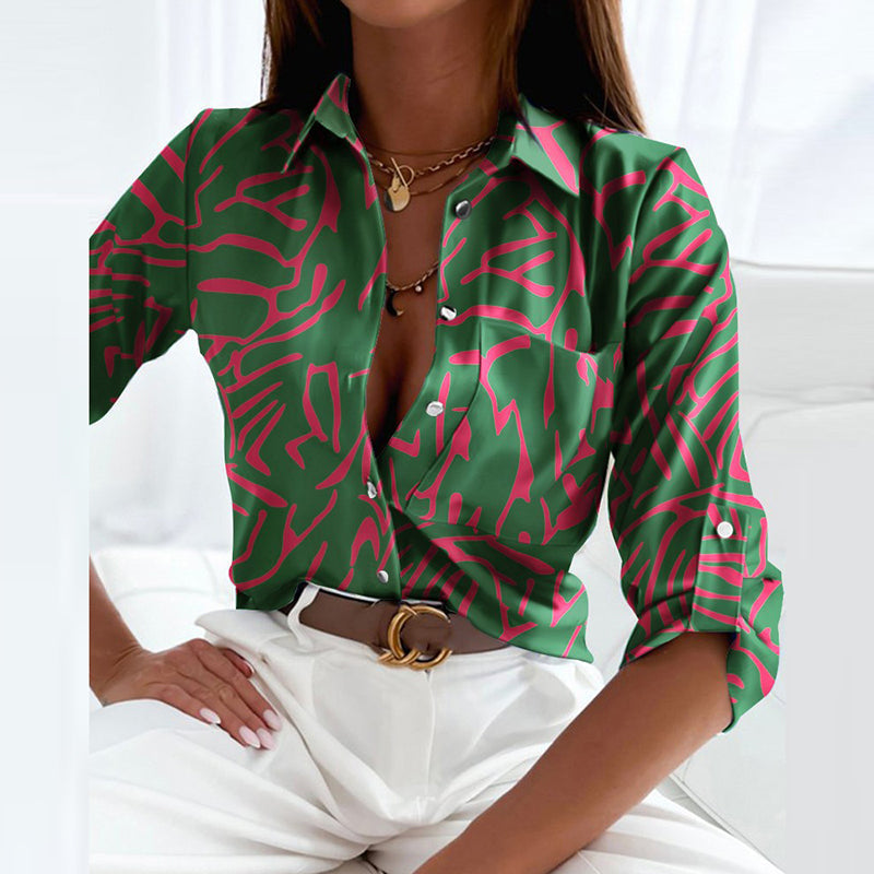 Jesie-London Darcey women's printed long sleeve button-up top with floral design and classic collar, shown on a model.