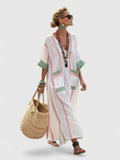 Jesie-London Abigail women's v-neck loose maxi dress, flowing fabric, and elegant design, shown in a full-length view.