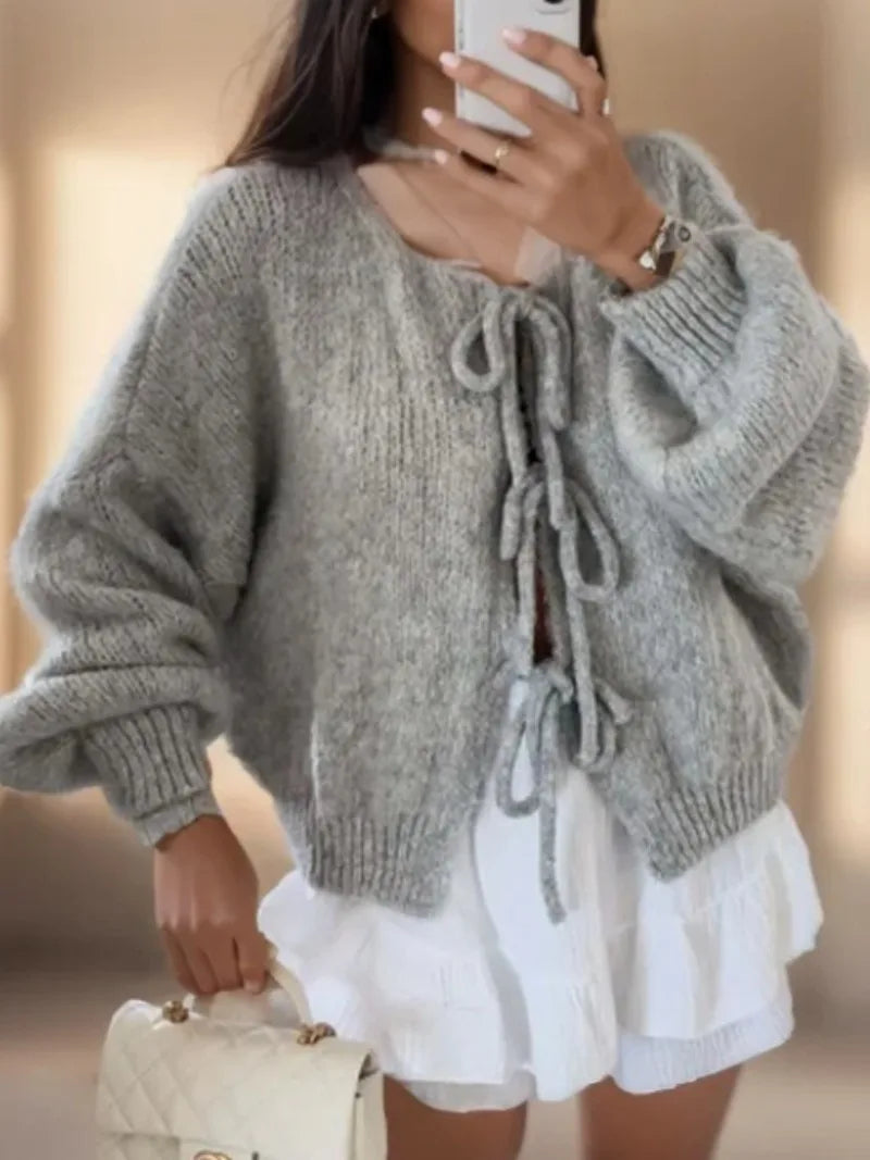Jesie-London Ella women's soft knit cardigan with bow ties, showcasing a cozy, stylish design and delicate tie details.