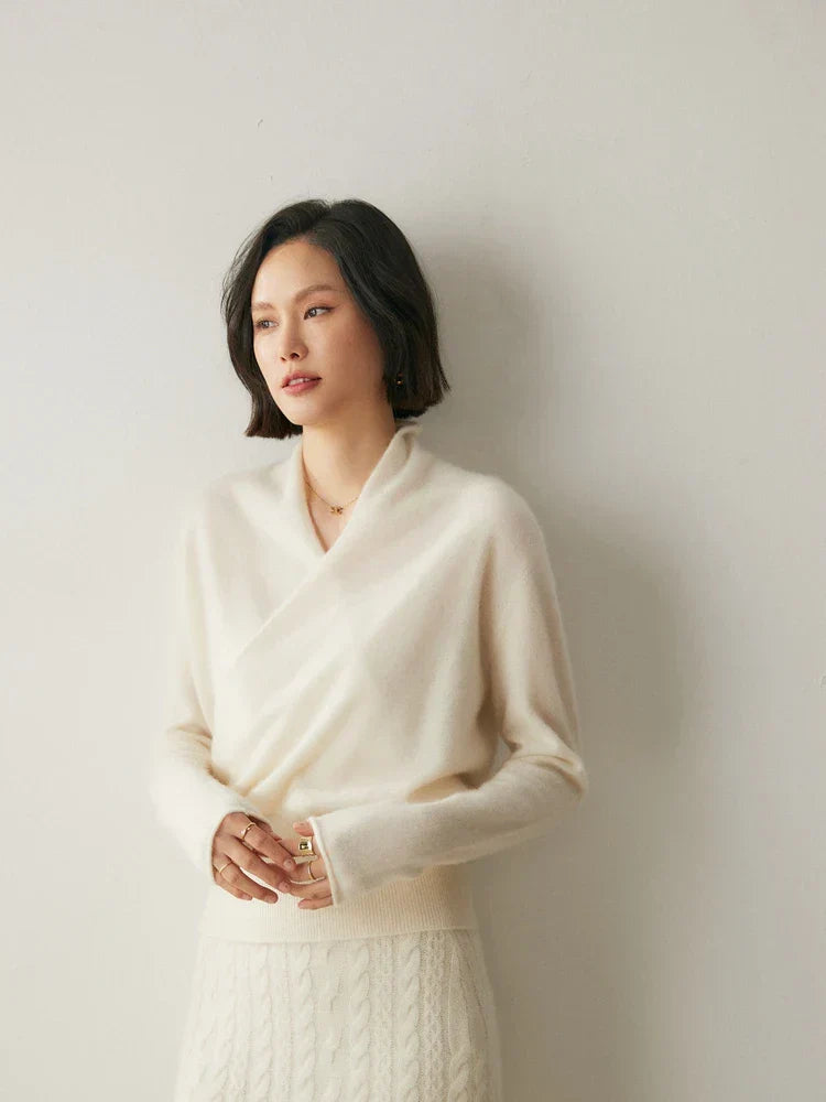 Women’s elegant wrap crossover chic sweater by Jesie-London, featuring a stylish, fitted design with long sleeves and a soft knit fabric.