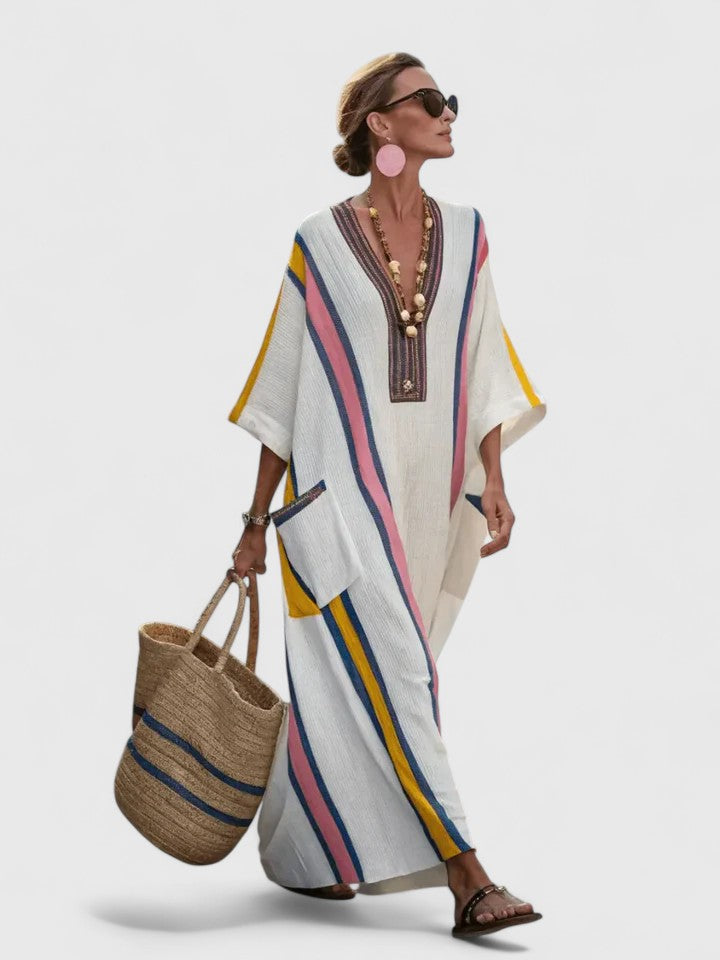 Jesie-London Abigail women's V-neck loose maxi dress in lightweight fabric, displayed on a hanger with a neutral background.