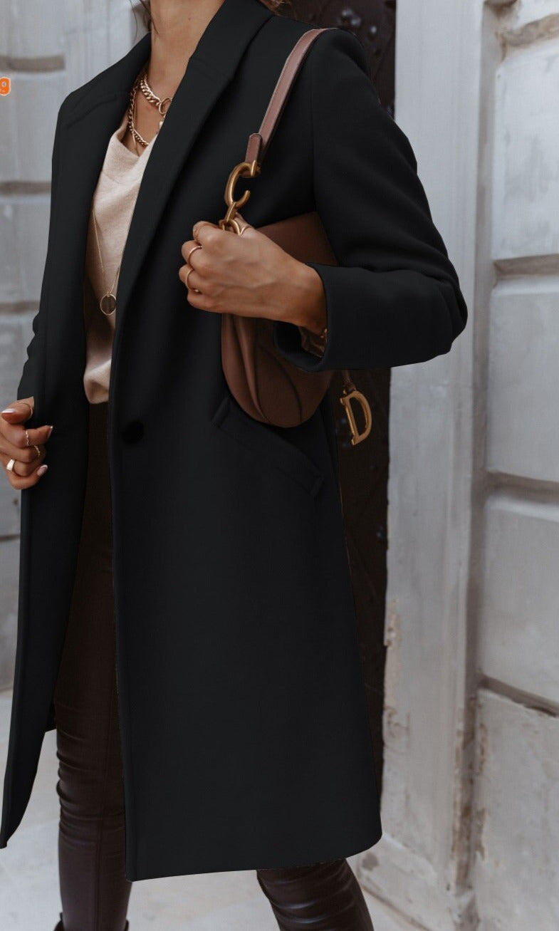 Women's elegant formal button front coat by Jesie-London, shown in a stylish, tailored design suitable for professional or dressy occasions.
