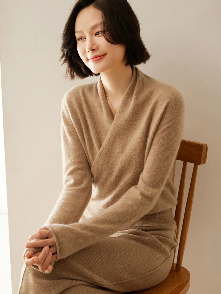 Women’s elegant Jesie-London Kate crossover wrap sweater displayed on a model, showcasing chic and stylish design.