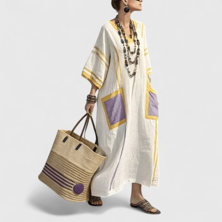 Women's loose fit maxi dress with pockets in Elizabeth style by Jesie-London, shown in a flowing, relaxed silhouette.