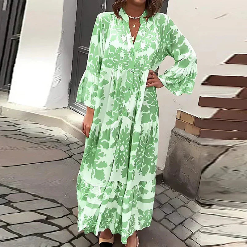 Jesie-London Ava women's boho printed long sleeve midi dress with flowing fabric and vibrant floral pattern.