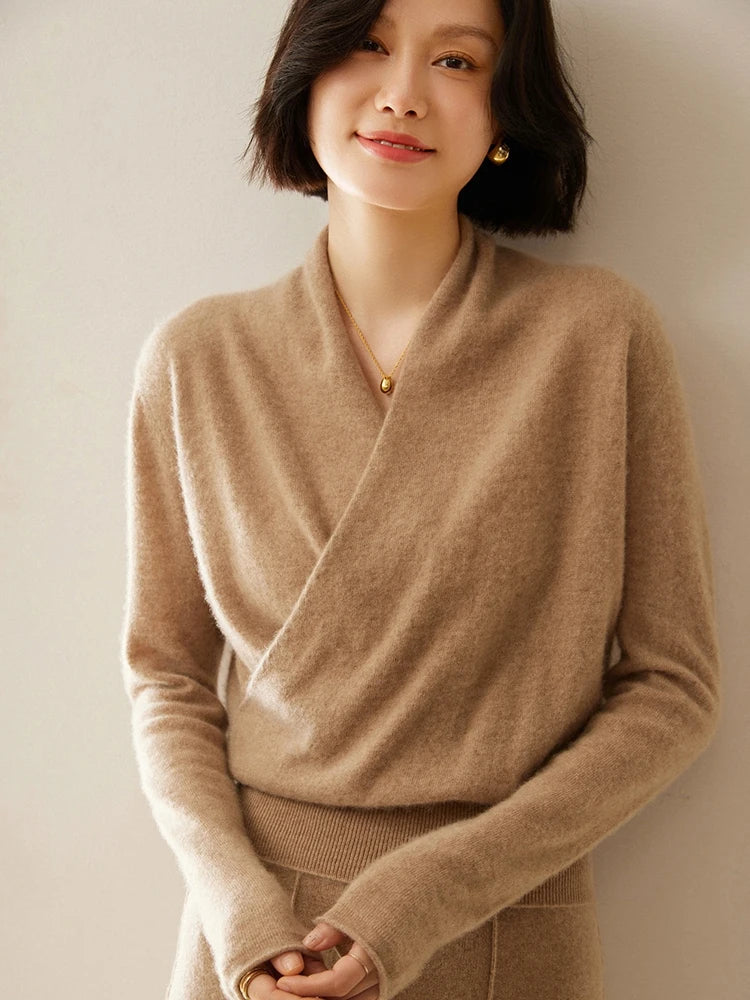 Women’s elegant wrap crossover sweater by Jesie-London, featuring a chic design and soft knit fabric in a stylish silhouette.