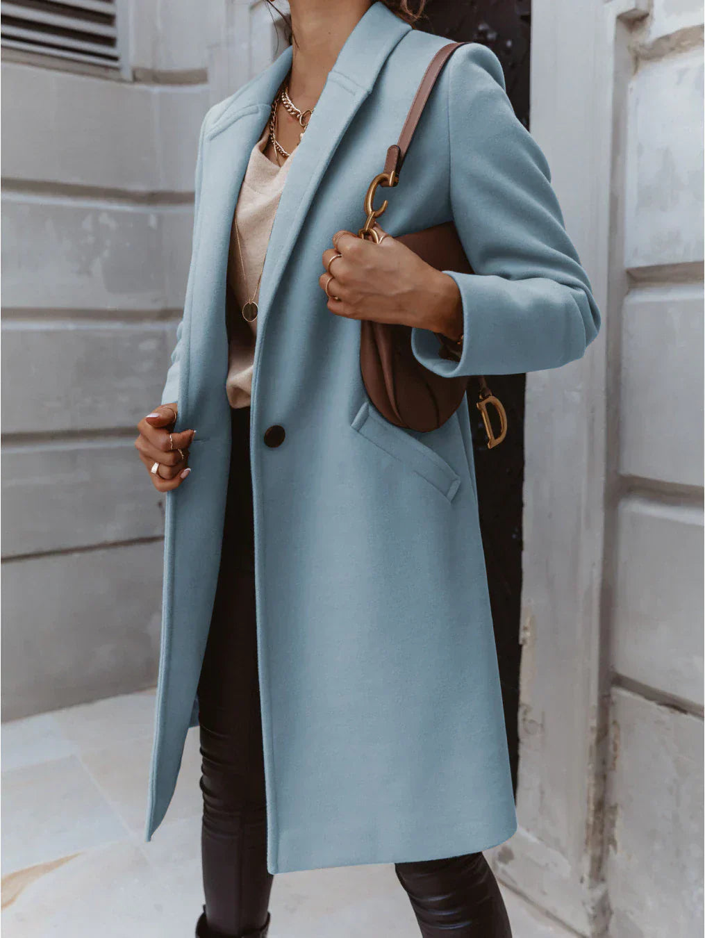 Elegant women's formal button-front coat by Jesie-London, featuring a sophisticated design and tailored fit for professional wear.