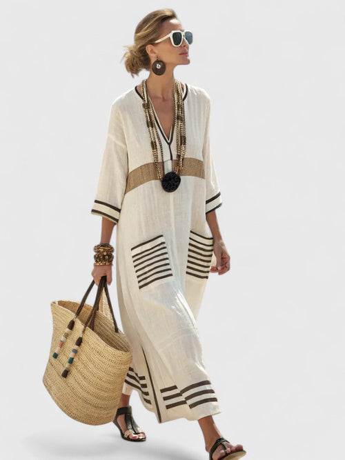 Women's V-neck loose maxi dress by Jesie-London featuring a flowy silhouette and casual style in soft fabric.