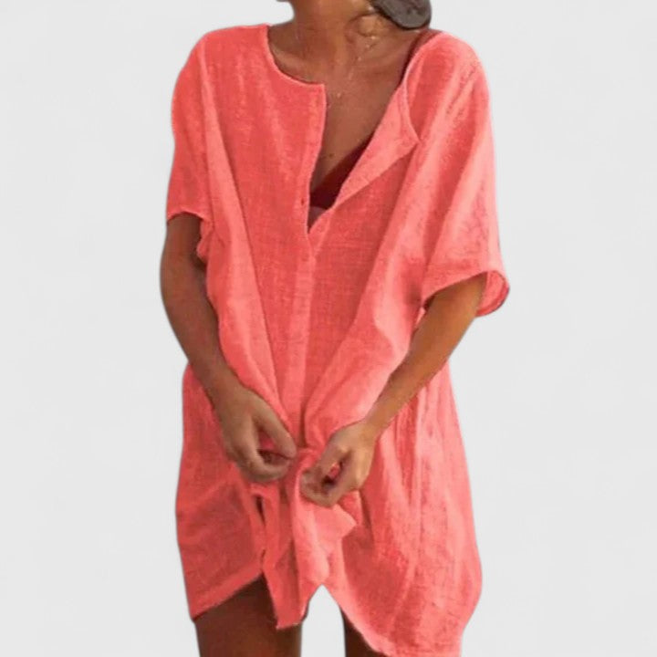 Jesie-London Lydia women's loose beach cover-up shorts with button details, lightweight and casual for summer beachwear.
