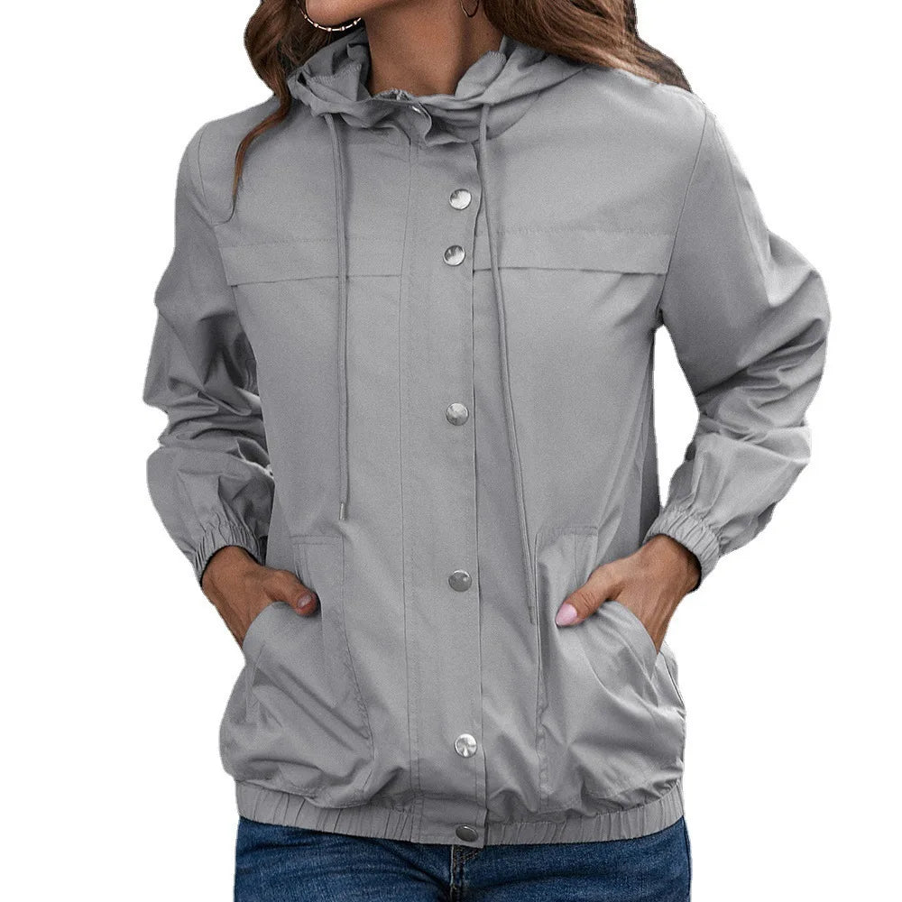 Women’s hooded fashion walking coat by Jesie-London, featuring a stylish design and cozy hood for outdoor wear.