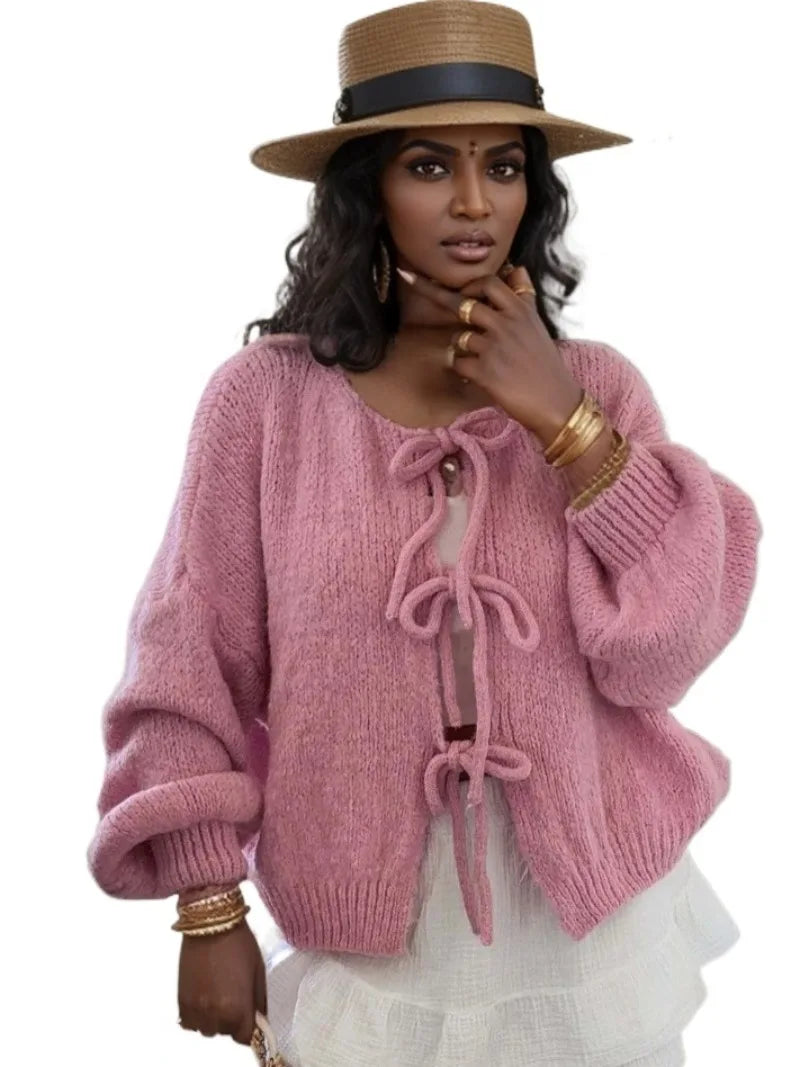 Jesie-London Ella women's soft knit cardigan with bow ties, lightweight sweater in pastel pink featuring long sleeves and front buttons.