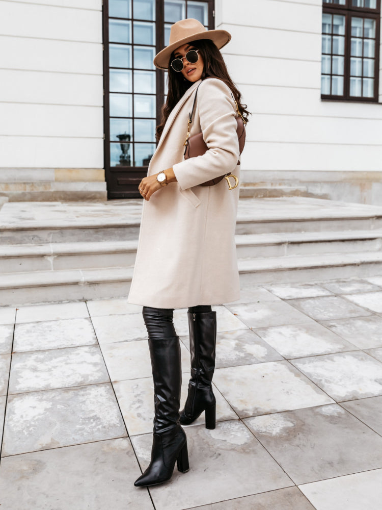 Women’s elegant formal button front coat by Jesie-London, featuring a tailored design and classic style.