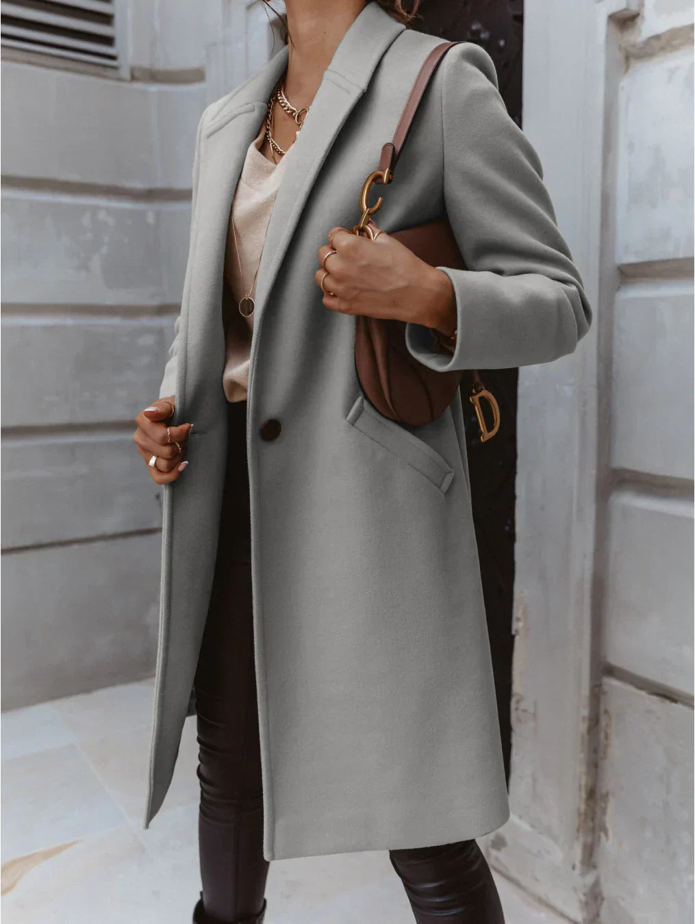 Elegant women's formal button-front coat by Jesie-London, featuring a tailored design and classic style for sophisticated occasions.