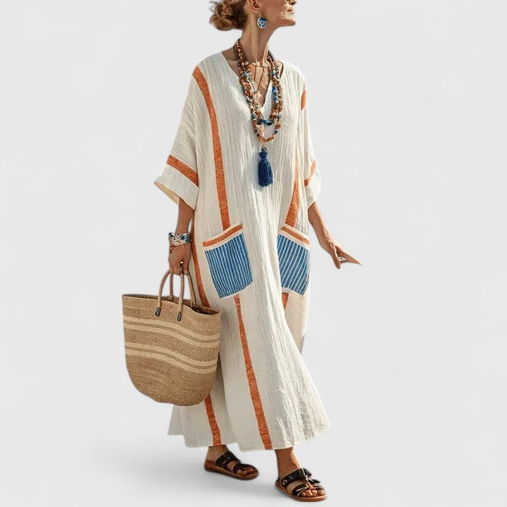 Women's loose fit maxi dress with pockets by Jesie-London, featuring a relaxed silhouette and casual style.