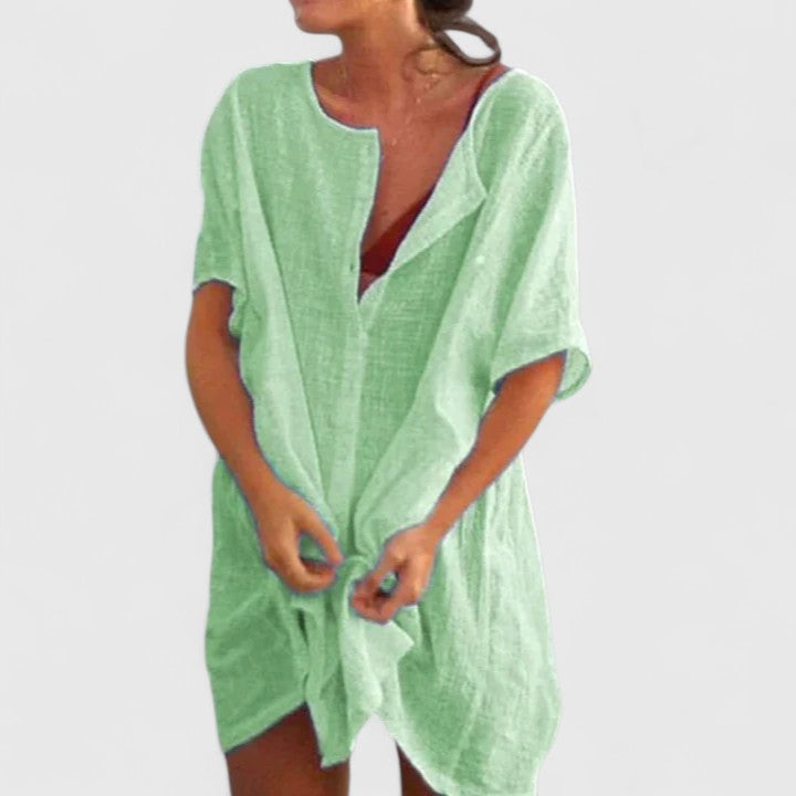 Women's Lydia loose button beach cover-up shorts by Jesie-London, showing lightweight fabric and relaxed fit on a model.
