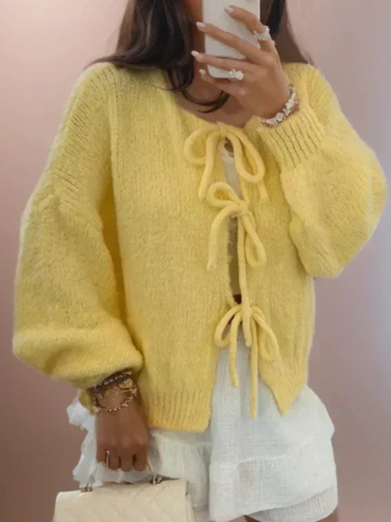 Jesie-London Ella women's soft knit cardigan with bow ties, featuring a cozy, stylish design in a neutral color.