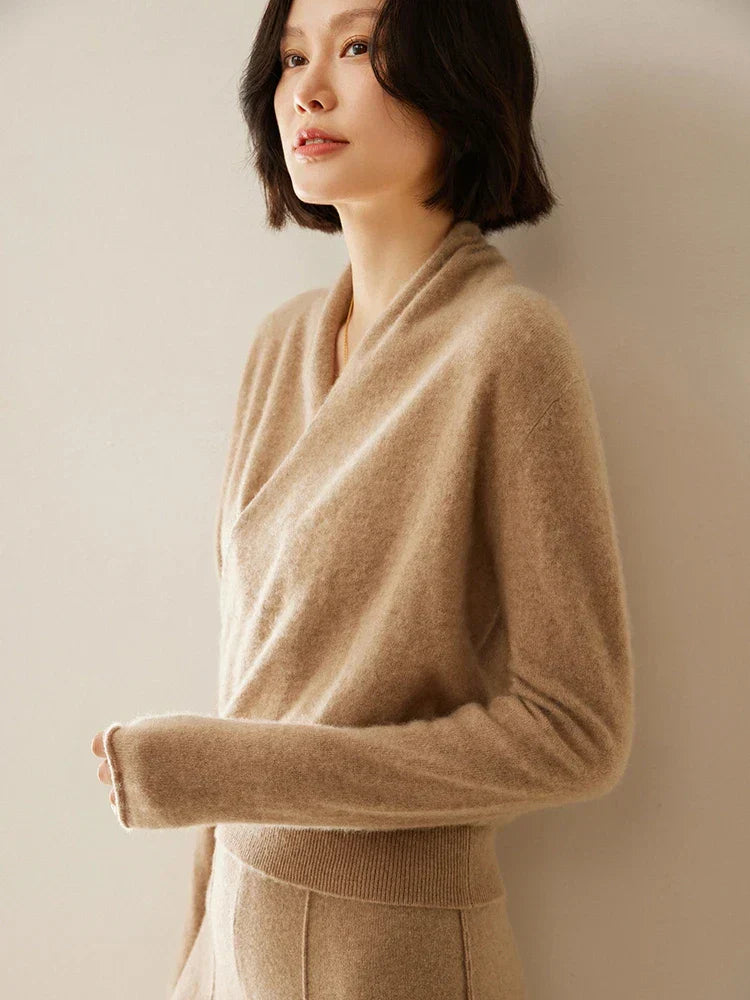 Women’s elegant wrap crossover chic sweater by Jesie-London, featuring a stylish, fitted design in soft knit fabric.