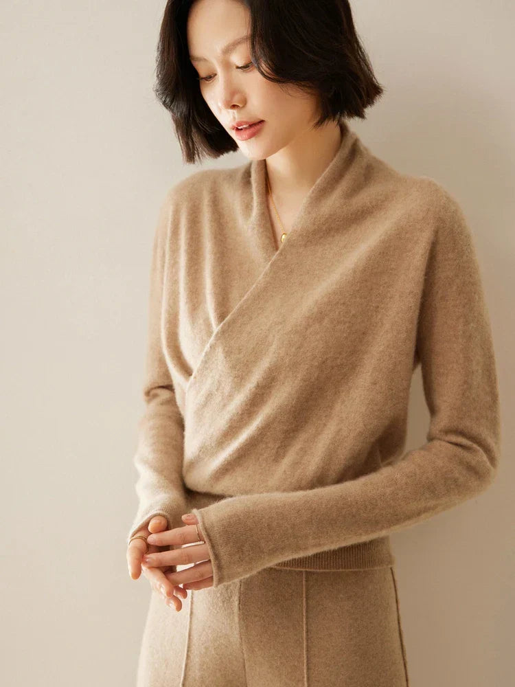 Women’s elegant wrap crossover chic sweater by Jesie-London, featuring a stylish crossover design and soft knit fabric.