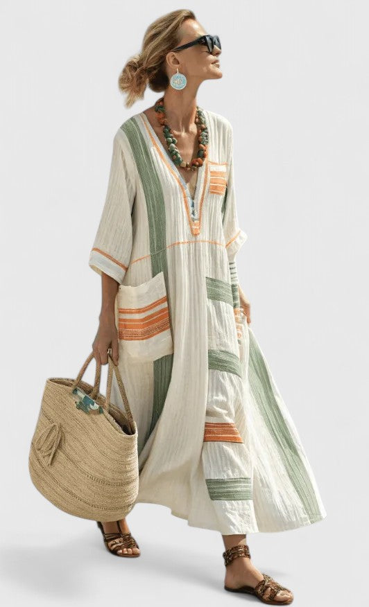 Jesie-London Abigail women's V-neck loose maxi dress displayed on a model, flowing fabric and elegant design for casual and dressy occasions.
