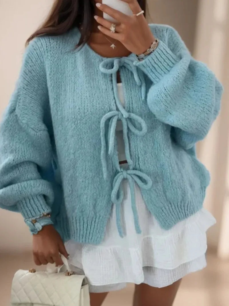 Jesie-London Ella women's soft knit cardigan with bow ties, featuring a cozy, stylish design and delicate detailing.