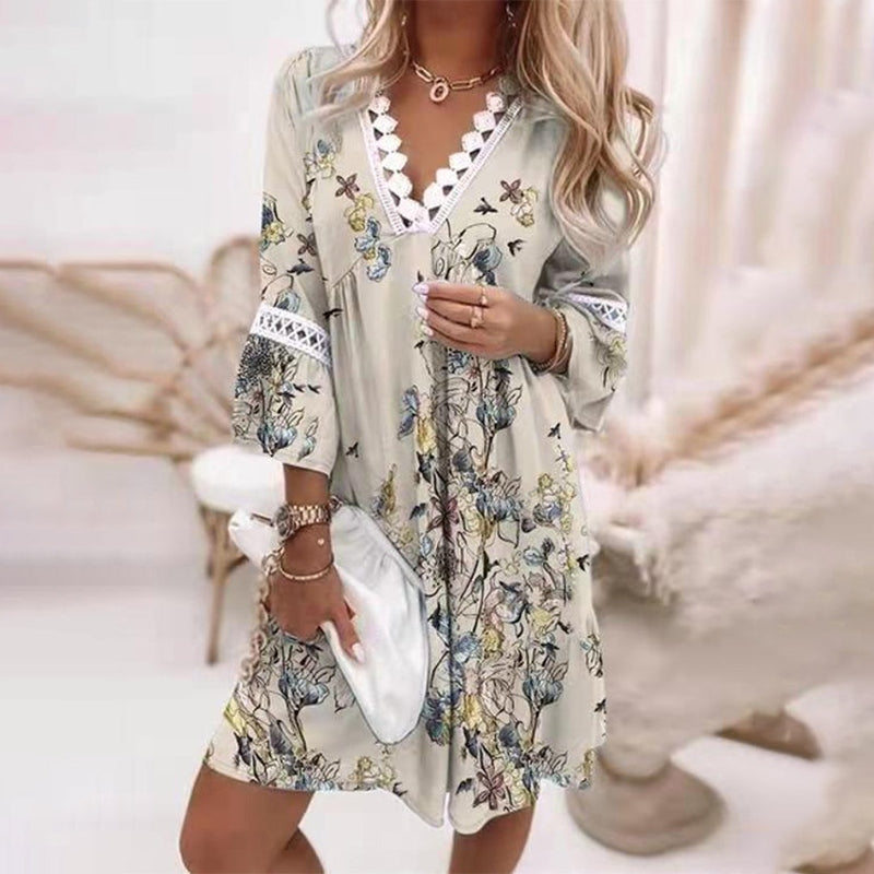 Jesie-London Audrey women's boho floral V-neck mini dress with colorful summer print, perfect for casual and outdoor occasions.