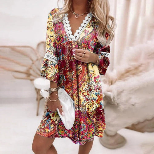 Jesie-London Audrey women's boho floral V-neck mini dress, lightweight summer dress with colorful floral pattern.