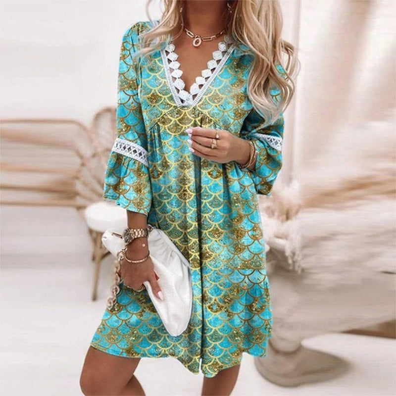 Jesie-London Audrey women's boho floral V-neck mini dress, vibrant summer dress with a relaxed fit and colorful floral pattern.