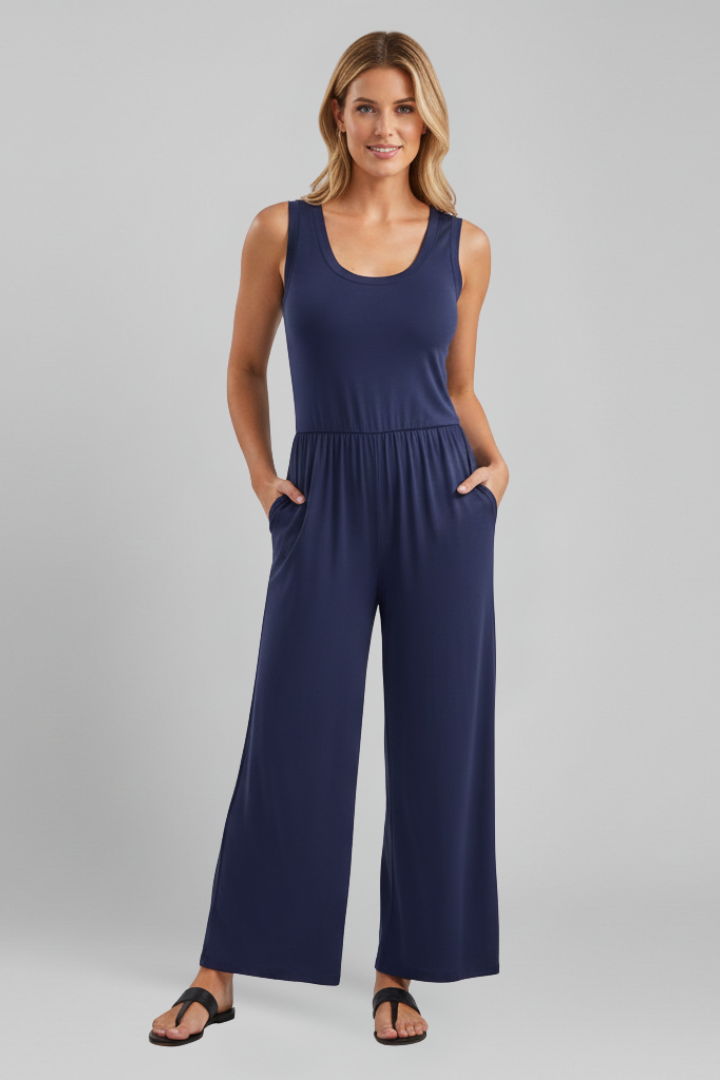 Jesie-London Stella women's wide-leg jumpsuit with round neckline and elastic waist, shown in a relaxed fit with flowing fabric.