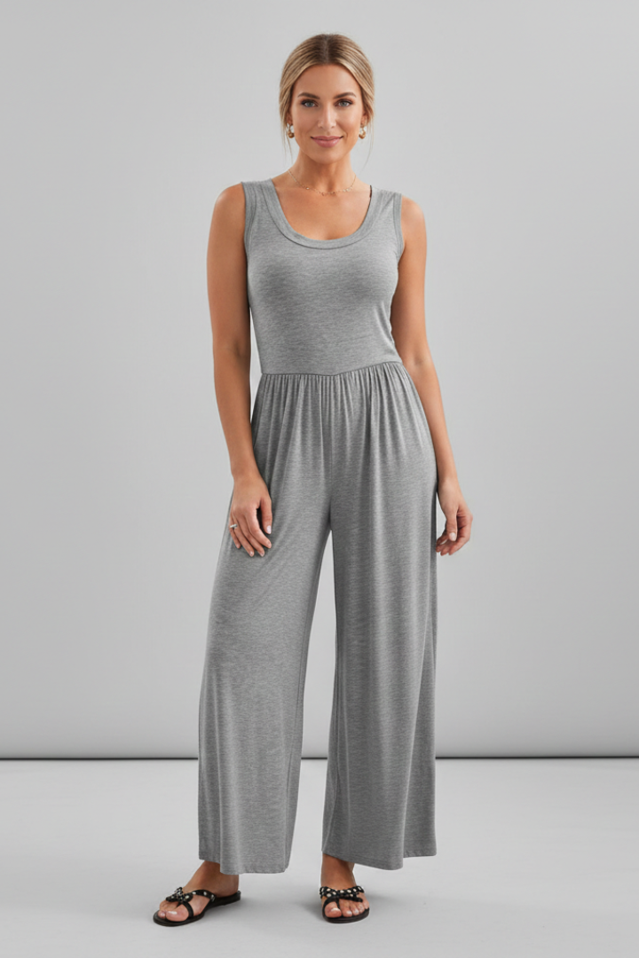 Women’s wide-leg jumpsuit by Jesie-London with round neckline and elastic waistband, featuring a relaxed fit and stylish design.