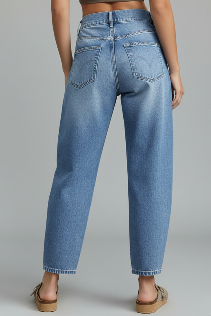 Jessica women's casual mid-waist denim jeans with front closure and pockets, featuring a classic blue wash and slim fit.