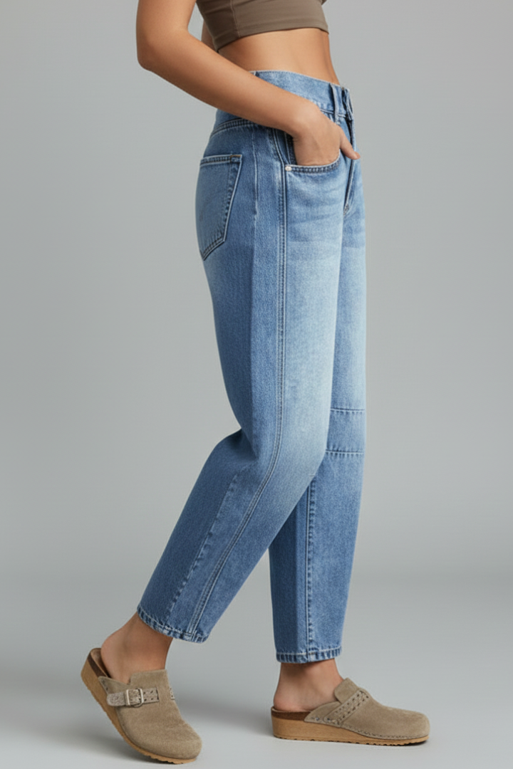 Jessica women's casual mid-waist denim jeans with front closure and pockets, styled with a relaxed fit and classic blue denim.