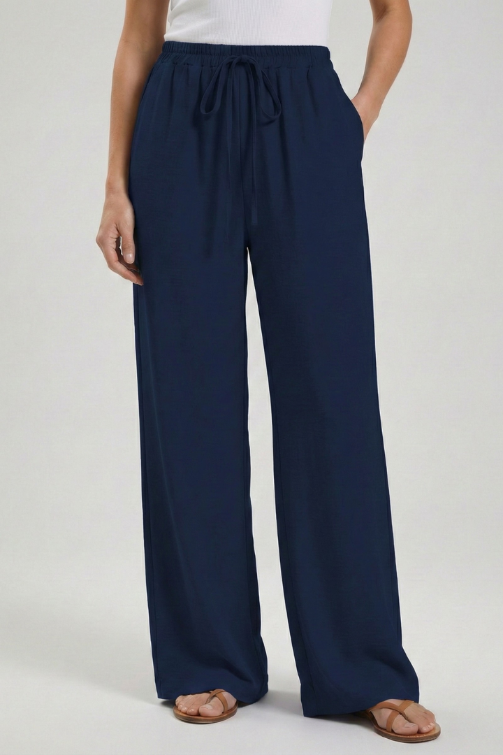 Jesie-London Catherine women's palazzo trousers with drawstring waist and side pockets, relaxed fit, stylish and comfortable.