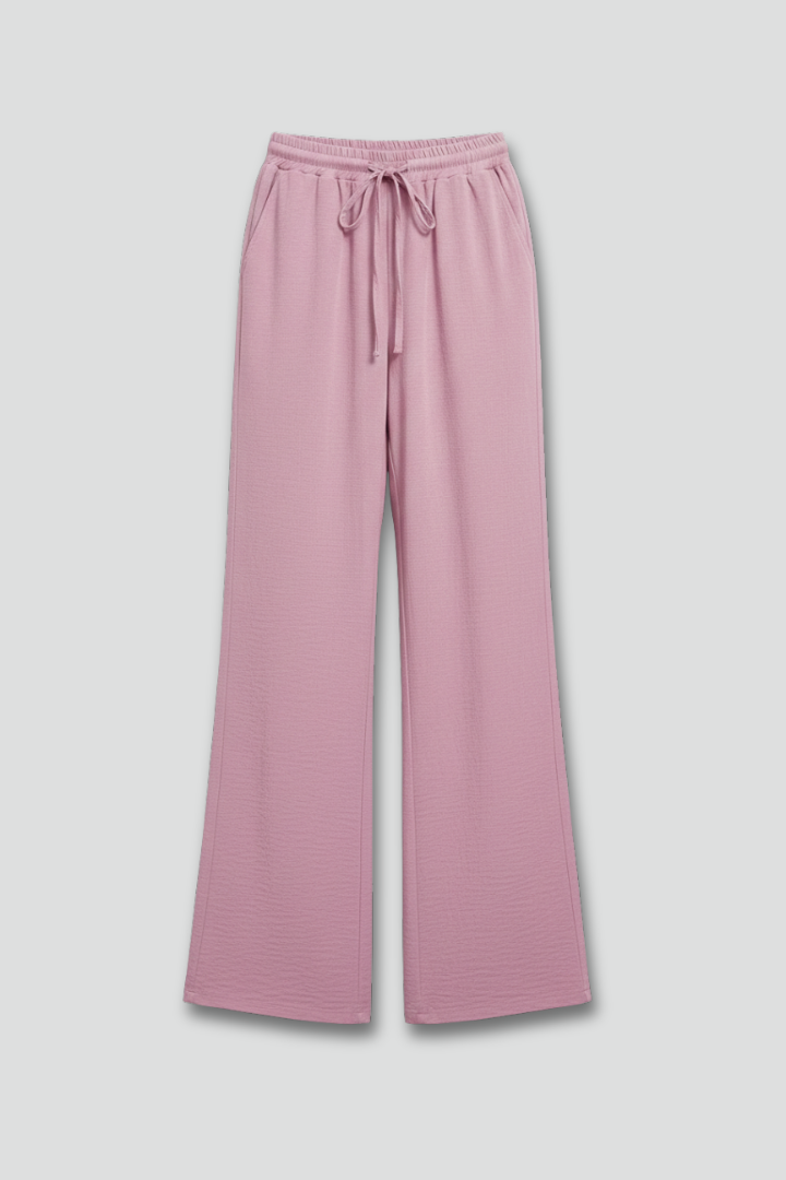 Women’s casual palazzo trousers with drawstring waist and side pockets from Jesie-London, featuring a relaxed fit and comfortable style.