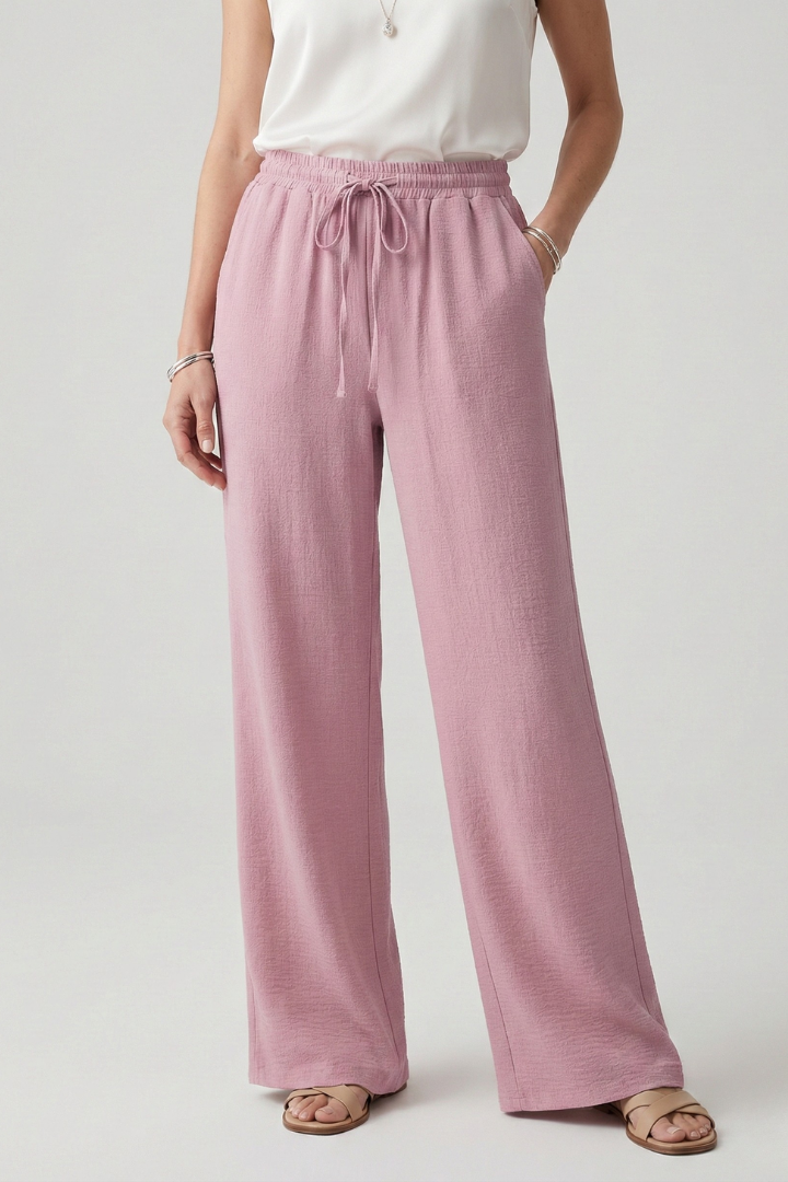 Jesie-London Bella women's casual palazzo trousers with drawstring waist and side pockets, flowy fabric and relaxed fit.