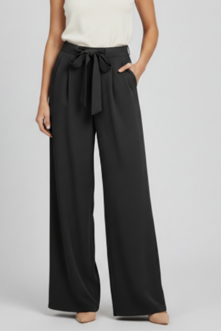 Women’s wide-leg palazzo trousers with drawstring waist and side pockets by Jesie-London, shown in black fabric.