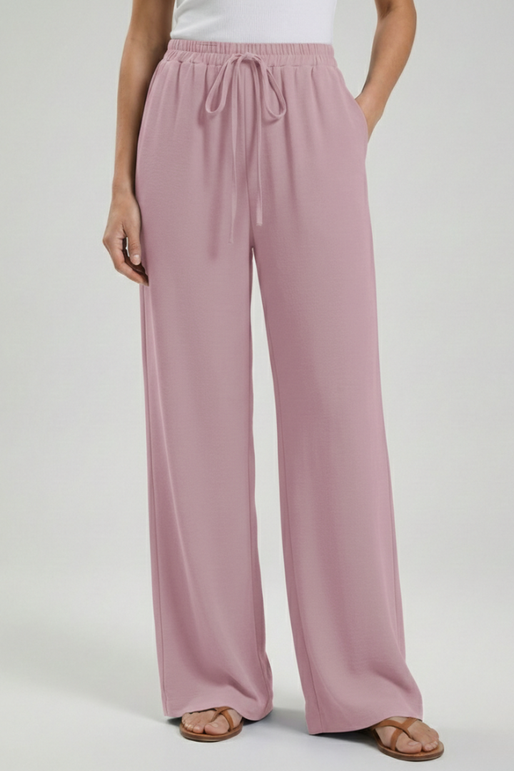 Jesie-London Catherine women's palazzo trousers with drawstring waist and side pockets, flowing wide-leg style for casual wear
